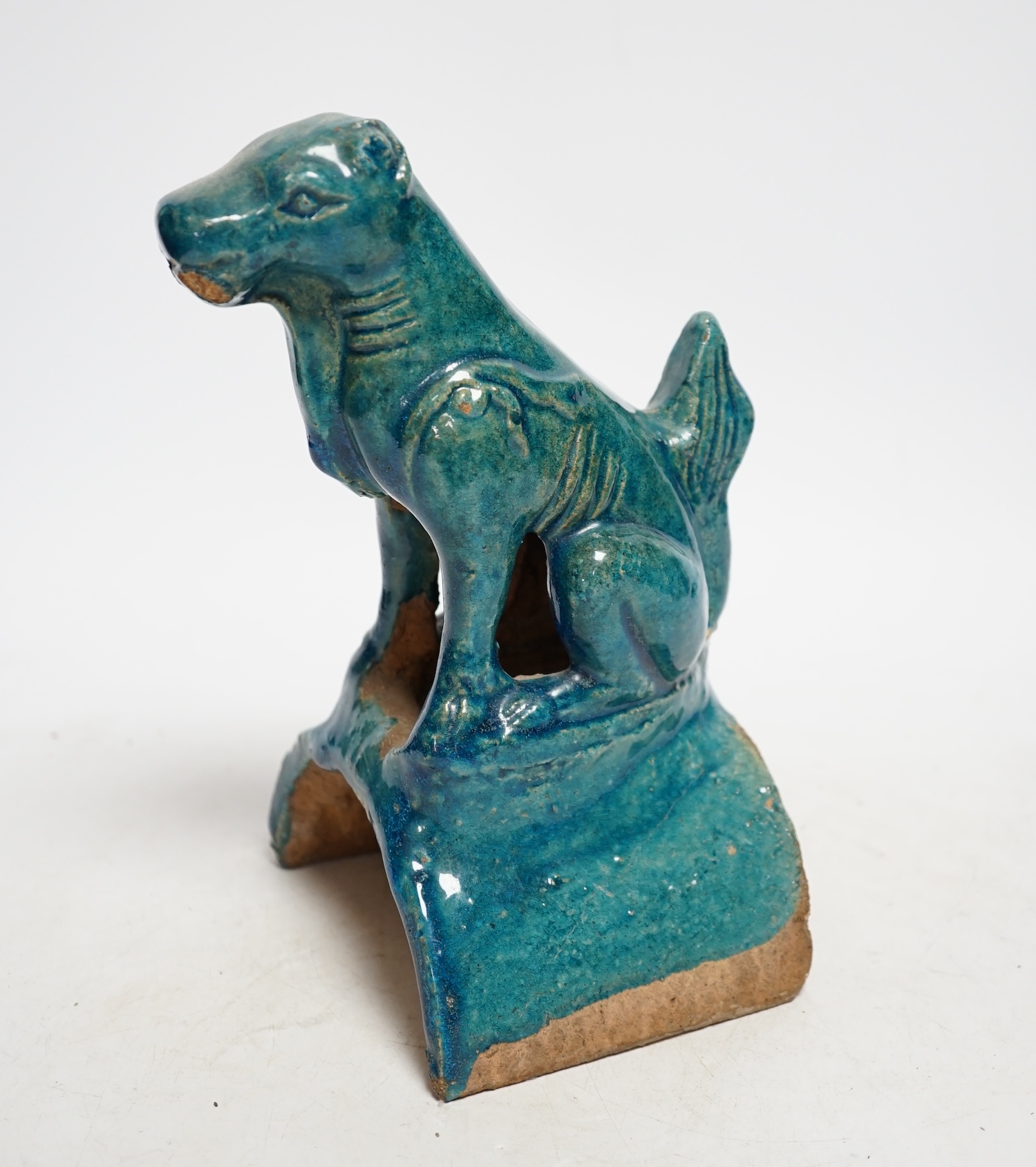 A Chinese turquoise glazed lion-dog ridge tile, Ming dynasty, 22cm high